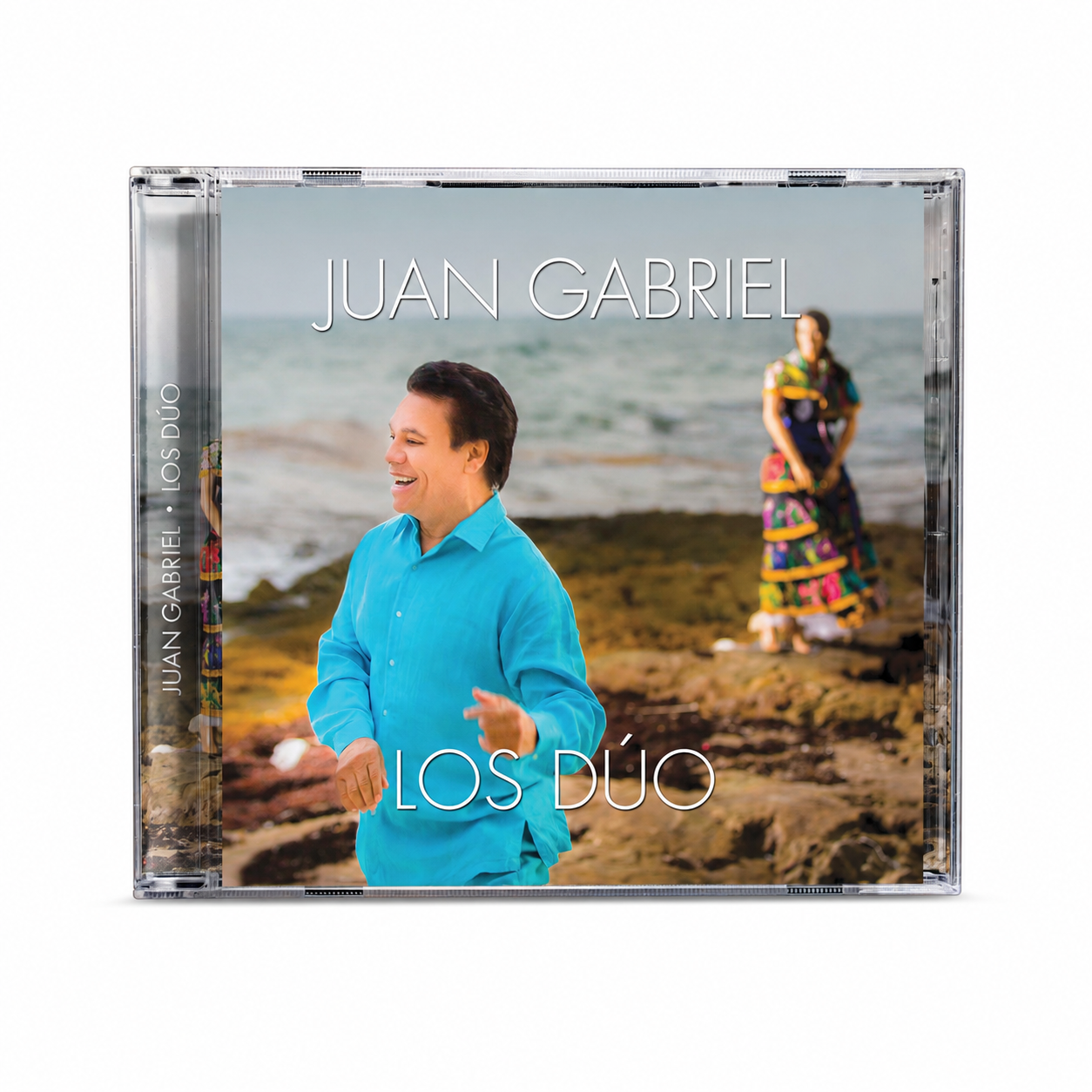CD cover of Juan Gabriel's 'Los Duo' with a man and woman by the ocean.